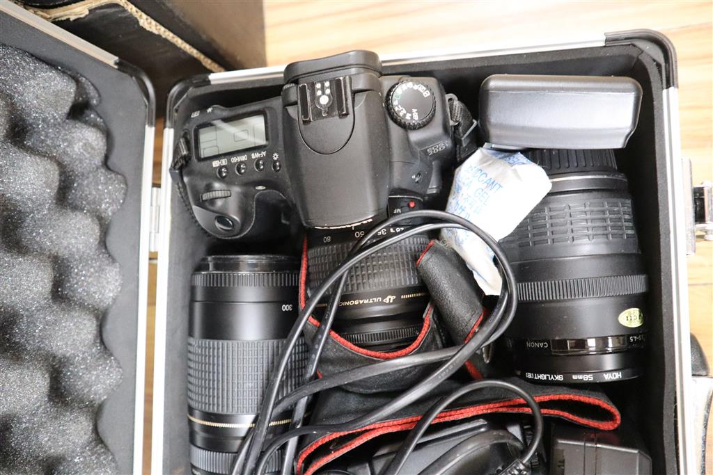 Two Canon EOS 20D digital cameras, lenses, flash guns and chargers and a Canon 350D digital camera